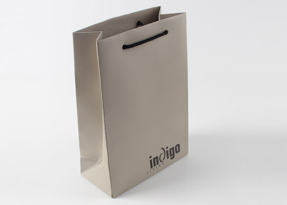 Eco Friendly Paper Shopping Bags With Nylon Rope Handles And Spot UV Surface Finishing