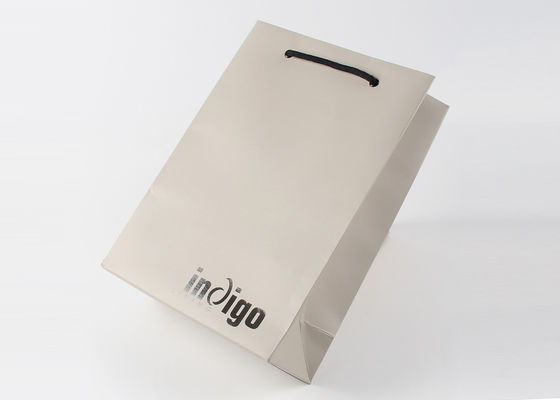 Eco Friendly Paper Shopping Bags With Nylon Rope Handles And Spot UV Surface Finishing